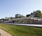 Joly & Loiret’s Wood-Wrapped French Racetrack Blends Into the Earth