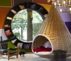Lively Urban Cabin in Brazil Features Nest Beds and a Spherical Shelf Window