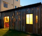 The Wall of Zudaji by 403 Architecture is a Scrappy Shed Made From Leftover Materials