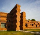 The Kantana Film Institute is Shaded by a Sawtooth Brick Wall in Thailand