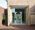 Flemish Renovation Combines a Modern ‘Rabbit Hole’ Entrance With Rural Tradition