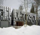 Prefab Mirror Mongayt Has a Pixelated Facade that Reflects Nature in Moscow