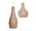 Etienne Esmenjaud’s Perforated Flat-Pack Lamps Are Made from Felt and Sustainable Wood