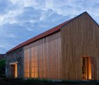 Portuguese Barn Transformed into Sun-Drenched Louvered Residence