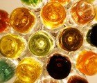 Tommaso Guerra Creates a Colorful Chandelier from Recycled Glass Jars