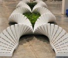 Twisting Modular Planter Holds Flourishing Micro Gardens Within its Layers