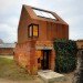 Haworth Tompkins, dovecoat, Dovecote Studio, prefab shelter, suffolk, Aldeburgh Music School, victorian ruins, red bricks, Prefab Housing, Green Lighting, Sustainable Building