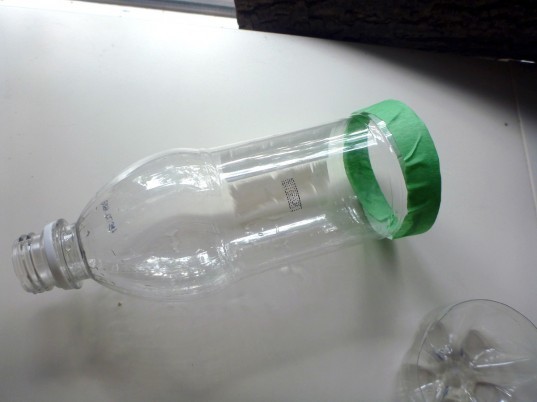 bottle planters, recycled bottle planters, hanging planters, diy planters, how to make a bottle planter, soda bottle planter, recycled materials, green gardening, eco gardening