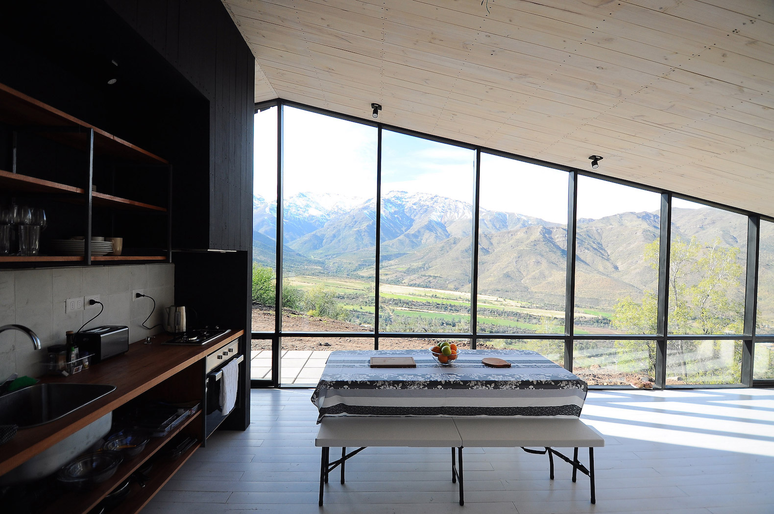RF C9 by Gonzalo Iturriaga, alpine architecture by Gonzalo Iturriaga, alpine architecture in Chile, contemporary alpine architecture, blackened pine cabin, modern alpine cabin, mountaineer refuge in San Esteban, RF C9 in Chile, RF C9