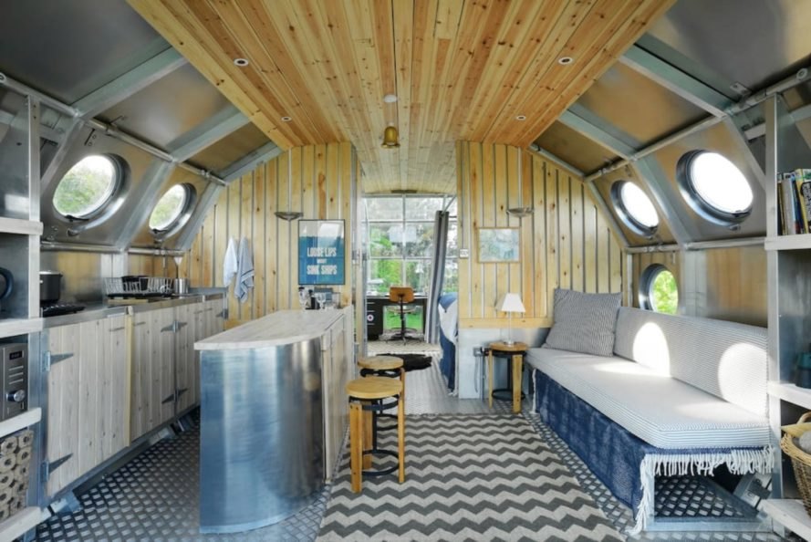 a curved interior covered in wooden panels