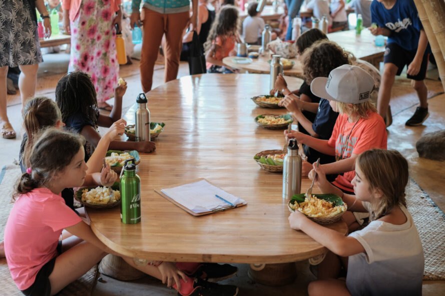 students eating fresh foods