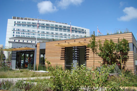 MK Lotus House at West Coast Green, designed by Michelle Kaufmann, prefab green home, green prefab house, net zero energy house, prefab home on lawn of San Francisco City Hall