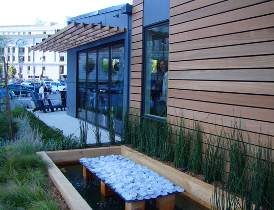 MK Lotus House, rainwater catchement, rainwater collection pond, West Coast Green, Michelle Kaufmann, prefab green home, green prefab house, net zero energy house, prefab home on lawn of San Francisco City Hall