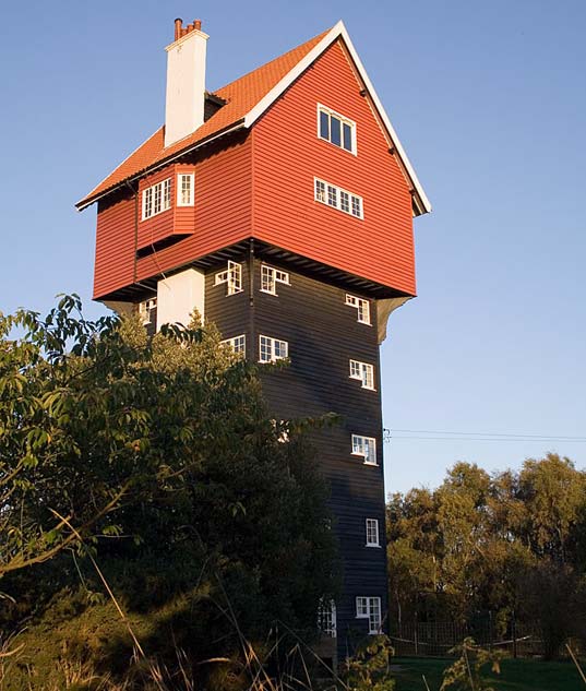 The "House in the Clouds" in Thorpeness, Suffolk, England is an old water tower converted into a home and later a bed & breakfast, water tower house, adaptive reuse, industrial conversion space, water tower home, house in the clouds, sky-high house, Thorpeness, Suffolk, England, bed and breakfast, bed & breakfast, green design, eco design, green building,