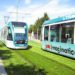 trams on grass, sustainable transportation, european public transportation, green transportation, urban design, urban heat island effect, green design, grass lined public transportation tracks