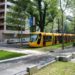 trams on grass, sustainable transportation, european public transportation, green transportation, urban design, urban heat island effect, green design, grass lined public transportation tracks