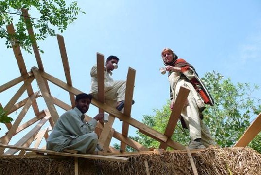 straw bail, straw bail building, Pakistan building, earthquake resistant building, handmade straw bales, PAKSBAB, Renewable building materials, Green building, affordable earthquake building