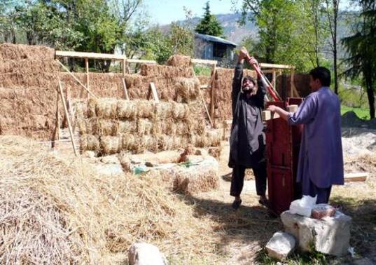 straw bail, straw bail building, Pakistan building, earthquake resistant building, handmade straw bales, PAKSBAB, Renewable building materials, Green building, affordable earthquake building