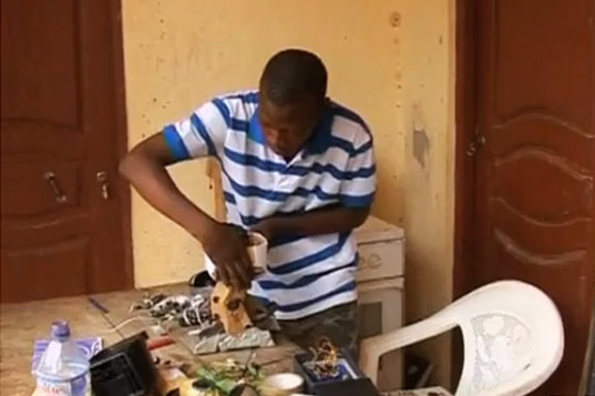 recycled materials, togolese student, togo, sam todo, sam10, recycled robot, robot made from tvs, student makes robot from tv parts, upcycling, robots, recycling, green design, africa, sustainable design, eco design