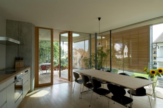 Minergie, 2010 passivhaus awards, passivhaus institute, halle 58, low enrgy apatment, green roof, pellet boiler, exterior shading, passivhaus apartment