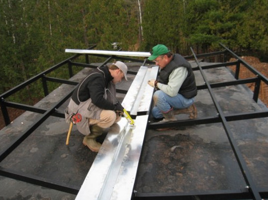 prefab housing, sun screen, sustainable design, green home, rainwater catchement, low impact design, heat pump, hydronic heating, Minnesota green home