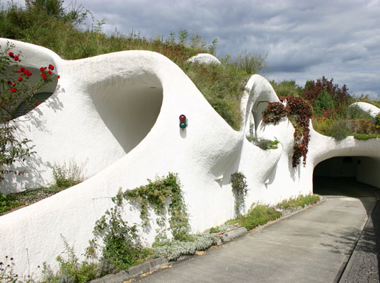earth house, vetsch architektur, Lättenstrasse estate, grass covered house, grass roof, green roof, underground house, underground home, buried house, daylighting, green architecture, sprayed concrete, eco architecture, green design