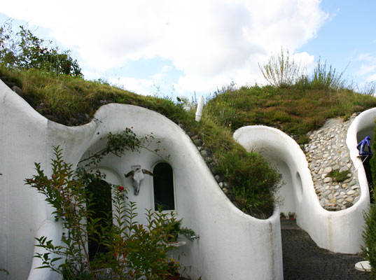 earth house, vetsch architektur, Lättenstrasse estate, grass covered house, grass roof, green roof, underground house, underground home, buried house, daylighting, green architecture, sprayed concrete, eco architecture, green design