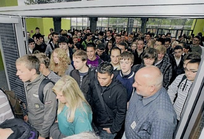 German green school, HHS Architecken, thin film solar roof, solar translucent roof, solar windows, repurposed school, reused building, solar powered school, natural ventalation