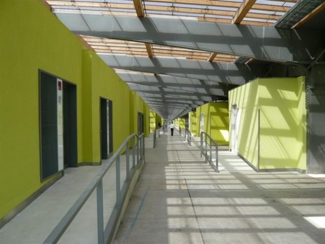 German green school, HHS Architecken, thin film solar roof, solar translucent roof, solar windows, repurposed school, reused building, solar powered school, natural ventalation