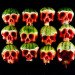 fruit skulls, eco art, Dimitri Tsykalov, recycled materials, gardening, fruit carving, skulls