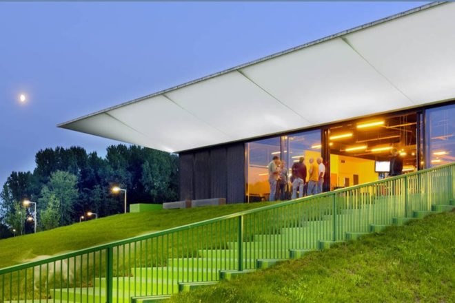 MoederscheimMoonen Architects, football club, LED area lighting, natural bleachers, Netherlands football club,