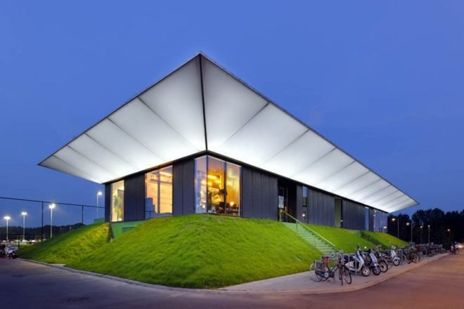MoederscheimMoonen Architects, football club, LED area lighting, natural bleachers, Netherlands football club,
