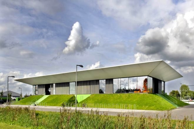 MoederscheimMoonen Architects, football club, LED area lighting, natural bleachers, Netherlands football club,