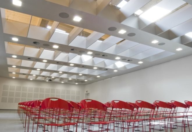 polins, marco acerbis, italy, auditorium, daylighting, solar power, casaclimate, green design, sustainable architecture