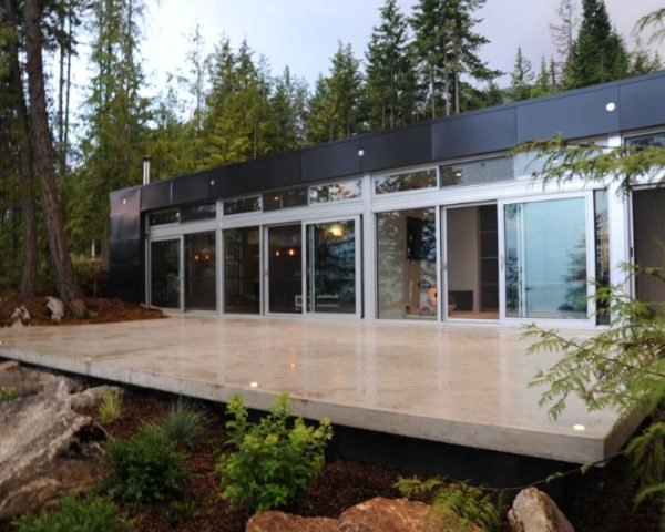 Rocio Romero's LVL Prefab is a Lakeside Home Nestled in the Trees