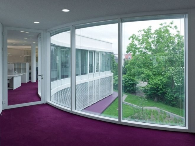 curved glass windows, passive solar, capillary mat ,lifecycle cost analysis,DGNB sustainable certificate program,Gerd Priebe Architect, German green building,