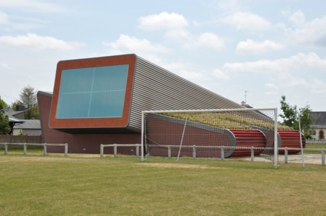 day lit gym, french green building, green gym, green roof, Jean Marc Rivet Gym, Saint Gilles building, solar panel roof,