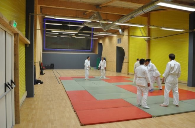 day lit gym, french green building, green gym, green roof, Jean Marc Rivet Gym, Saint Gilles building, solar panel roof,