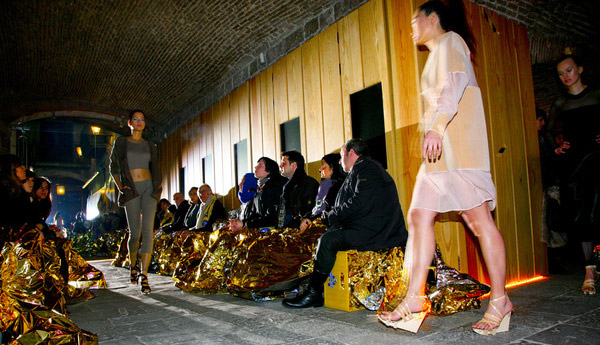 modafad, external reference, temporary structure, fashion show, green design, beer crate robot, giant yellow robot, the dude, damien, crate robot, recycled beer crate, beer crate, eco design, sustainable design, modafad 2010