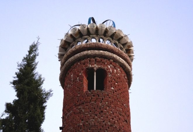 Don Justo, eco church, faith based green, green cathedral, green church, green house of worship, Justo Martinez, Lady of The Pillar Cathedral, recycled building materials, reused brick, salvaged building, salvaged building materials, Spanish Cathedral