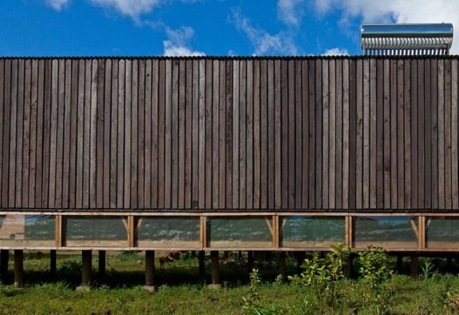 rain catchment, AATA Associate Architects, water catchment, chilean green design, Island green cabin, easter island cabin, green cabin design, prefab cabin, natural ventilation, solar batch heater, eco cabin, eco vacation, green tourist cabin,