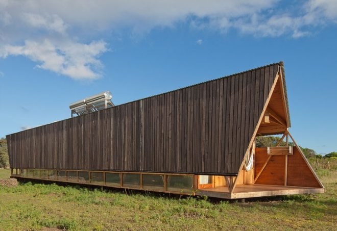 rain catchment, AATA Associate Architects, water catchment, chilean green design, Island green cabin, easter island cabin, green cabin design, prefab cabin, natural ventilation, solar batch heater, eco cabin, eco vacation, green tourist cabin,