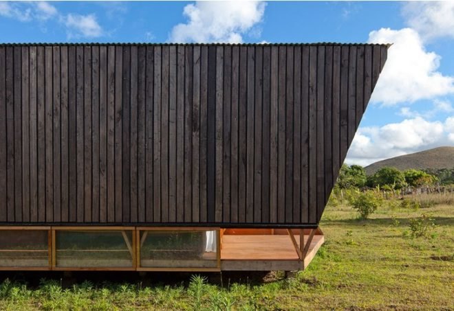 rain catchment, AATA Associate Architects, water catchment, chilean green design, Island green cabin, easter island cabin, green cabin design, prefab cabin, natural ventilation, solar batch heater, eco cabin, eco vacation, green tourist cabin,