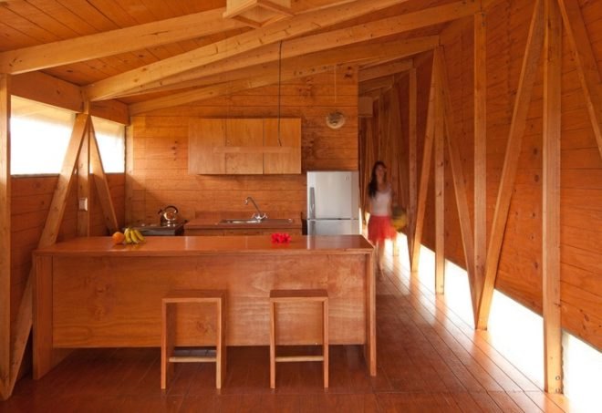rain catchment, AATA Associate Architects, water catchment, chilean green design, Island green cabin, easter island cabin, green cabin design, prefab cabin, natural ventilation, solar batch heater, eco cabin, eco vacation, green tourist cabin,