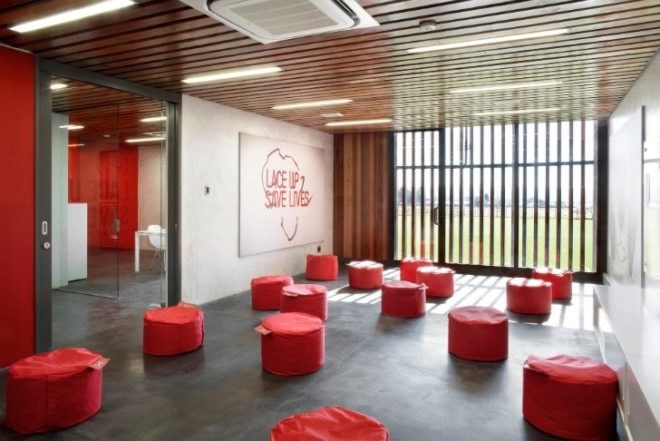 soweto, football training centre, south africa, rufproject, solar passive design, wooden louvers