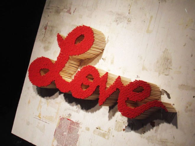 pei san ng, love sign, recycled materials, recycled love sign, sign made of matches, matchstick love sign, eco art green design, eco design, reclaimed materials, green art