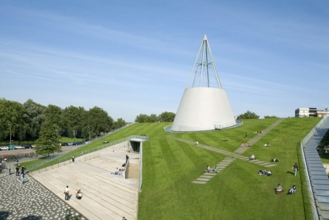 Mecanoo Architecten, green library, green roof, green building Netherlands, dutch green building, green campus, library daylighting, sled roof, ski roof, 1990s green architecture, eco library,