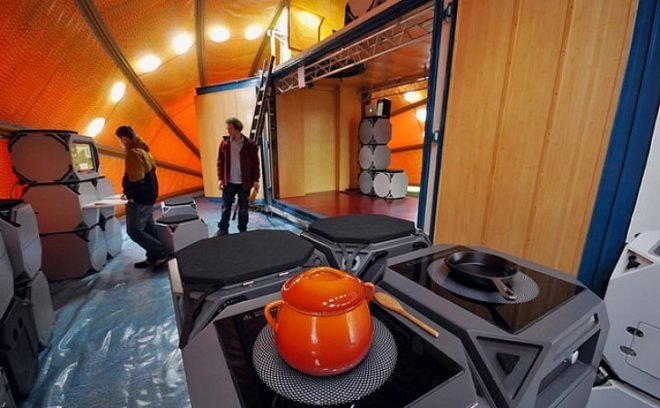 World In A Shell, Hans Kalliwoda, shipping container, off-grid, renewable energy, exhibition space