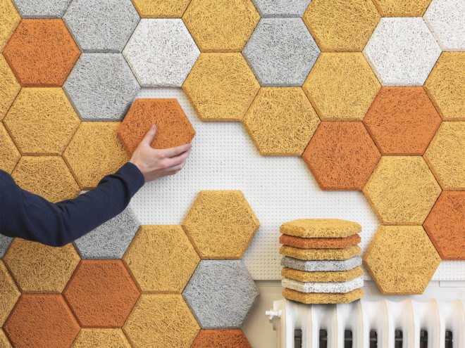 Form Us With Love's wood wool tiles being applied to a wall