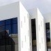 solar energy, solar power, photovoltaic panels, passive design, south-facing, Greece, solar panel factory, solar gain, energy efficiency, green design, Henning Larsen